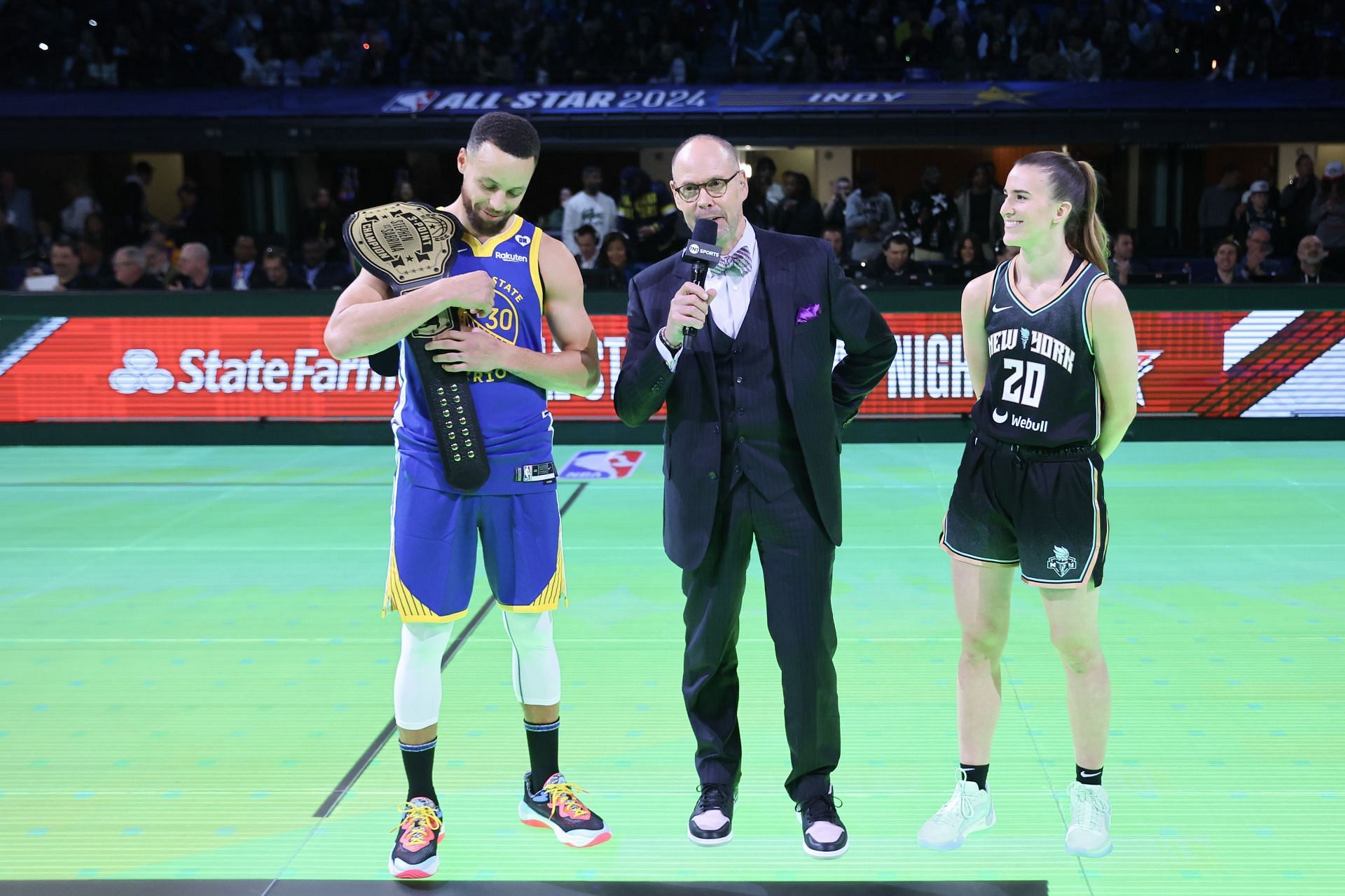 Stephen Curry #30 of the Golden State Warriors and Sabrina Ionescu #20 of the New York Liberty after their 3-point challenge - Source: Getty